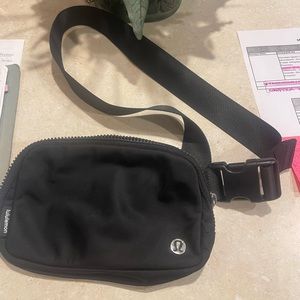 Lululemon belt bag black never used